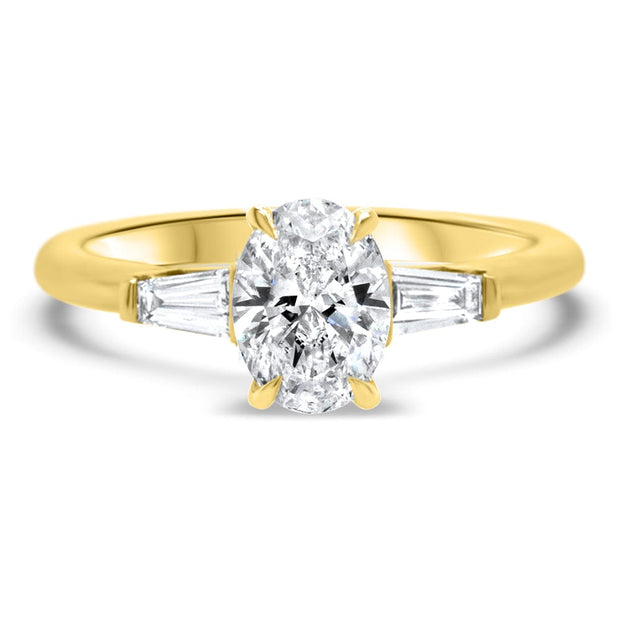 Iris Oval Cut and Tapered Baguette Engagement Ring Yellow Gold | Noah James Jewellery.