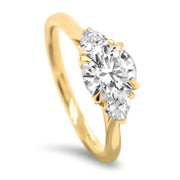 Aquila Round Brilliant and Trilliant Cut Engagement Ring Yellow Gold | Noah James Jewellery.