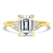 Margot Emerald Cut and Round Brilliant Cut Trefoil Shoulder Engagement Ring Yellow Gold | Noah James Jewellery.