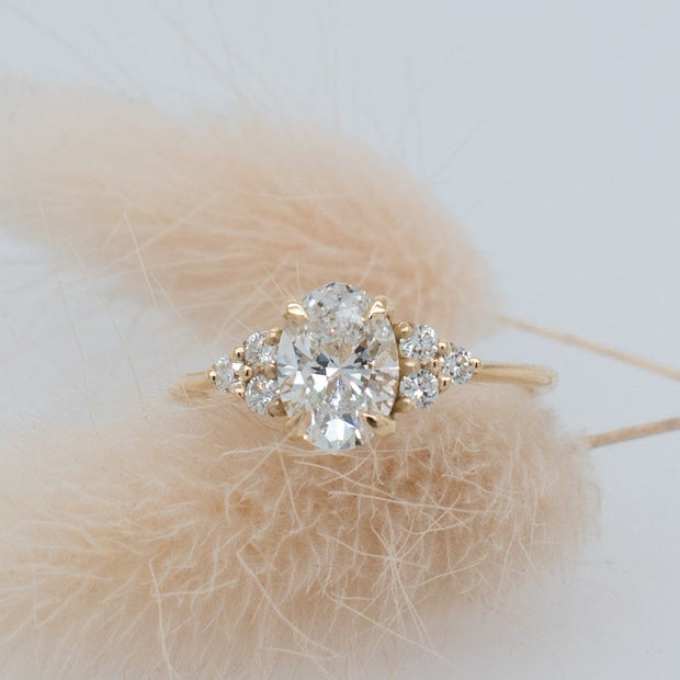 Margot Oval and Round Brilliant Cut Trefoil Shoulder Engagement Ring Platinum | Noah James Jewellery.