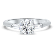Iris Round Brilliant Cut and Tapered Baguette Engagement Ring Platinum | Noah James Jewellery.