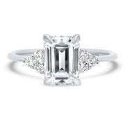 Margot Emerald Cut and Round Brilliant Cut Trefoil Shoulder Engagement Ring Platinum | Noah James Jewellery.