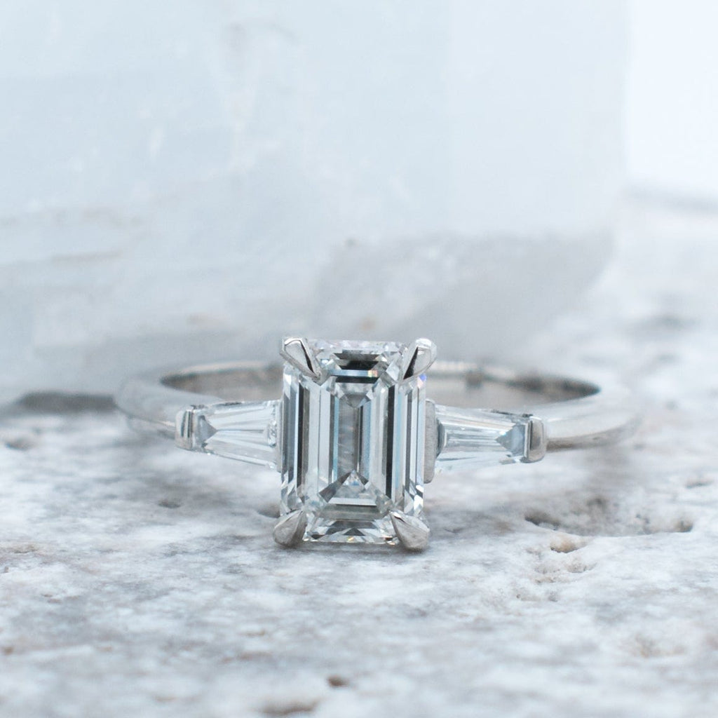 Engagement Ring with an Emerald Cut Diamond and Baguette Side Stones in  Platinum - Kwiat