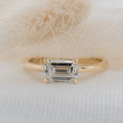 Noah James Jewellers Manchester In Stock Engagement Ring Thalia Emerald Cut East West Claw Set Lab Grown Diamond Solitaire Engagement Ring Yellow Gold - 1ct Lab Grown Diamond Moissanite