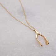 Ida Gold Wishbone Pendant | Noah James Jewellery.