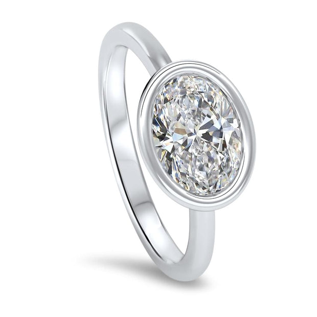 Rosa Oval Cut East West Rubover Solitaire Engagement Ring Platinum | Noah James Jewellery.